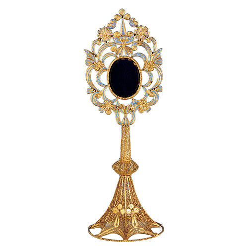 Reliquary in silver 800, oval shaped and filigree decorated 1