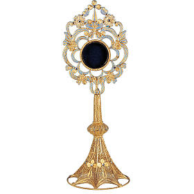 Reliquary in silver 800, round shaped and filigree decorated