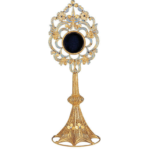 Reliquary in silver 800, round shaped and filigree decorated 1