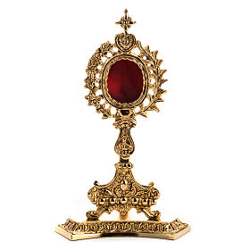 Reliquary in gold-plated brass with base