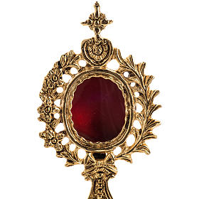 Reliquary in gold-plated brass with base