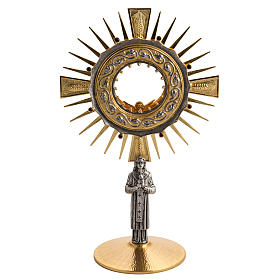 Monstrance in brass with saint figurine