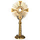 Monstrance in brass with figurines in bronze, with red stones s1