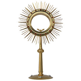 Monstrance for Magna host in golden brass with red stones