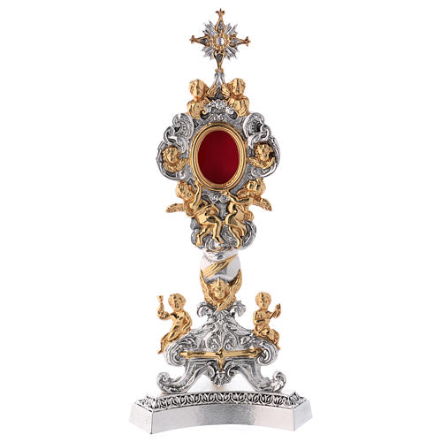 Reliquary in bicolor brass with golden angels 1
