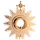 Monstrance in brass, baroque style, golden plated 24k, 9.5 cm diam. case s9
