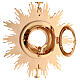 Monstrance in brass, baroque style, golden plated 24k, 9.5 cm diam. case s10