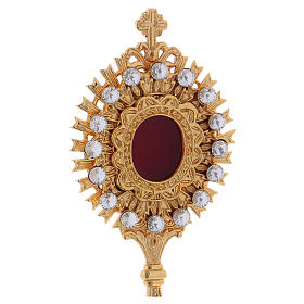 Reliquiario in ottone dorato con pietre sintetiche bianche