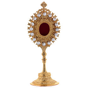 Gold plated brass reliquary with white synthetic stones