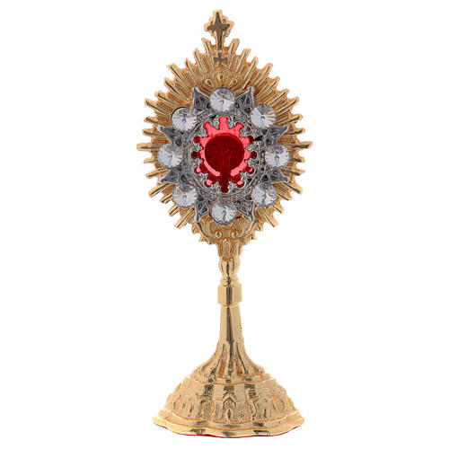 Reliquary in golden brass with white decorative gemstones, h. 14 cm 1