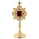 Gold plated brass reliquary with colored stones and square viewing window s1