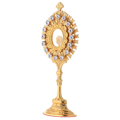 Gold plated brass reliquary with white crystals h 8 in 3