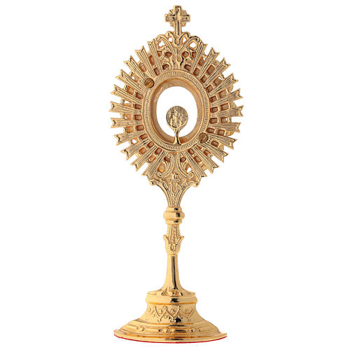 Gold plated brass reliquary with white crystals h 8 in 5