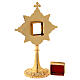 Brass reliquary with gold leaf and crystals 1.8x1.6 in window s5