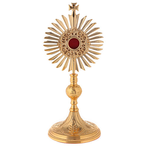 Gold plated brass reliquary with decorated node and rays frame h 11 in 1