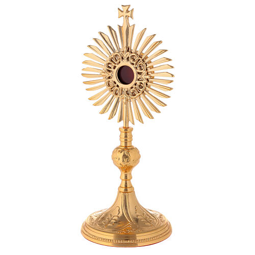 Gold plated brass reliquary with decorated node and rays frame h 11 in 3