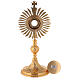 Gold plated brass reliquary with decorated node and rays frame h 11 in s5
