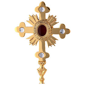 Oval reliquary with budded cross and rays, gold plated brass 28 cm