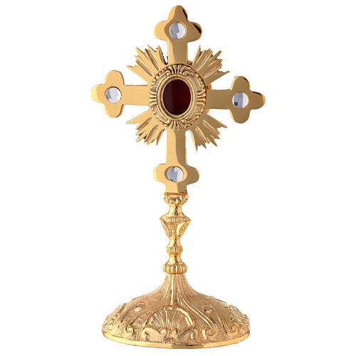 Oval reliquary with budded cross and rays, gold plated brass 28 cm 1