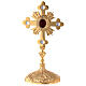 Oval reliquary with budded cross and rays, gold plated brass 28 cm s1