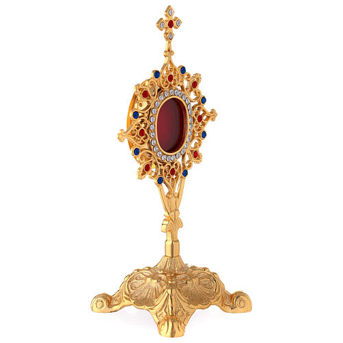 Oval baroque reliquary of brass and crystals 9 1/2 in 5