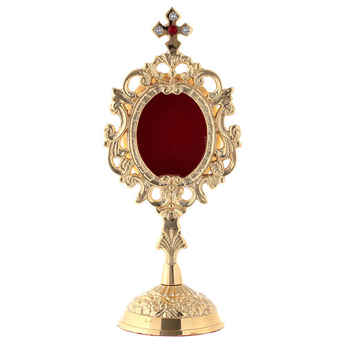 Reliquary with circular base, h 18 cm, gold plated brass 1