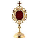 Reliquary with circular base, h 18 cm, gold plated brass s1