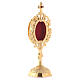 Reliquary with circular base, h 18 cm, gold plated brass s3