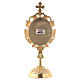 Reliquary with circular base, h 18 cm, gold plated brass s4