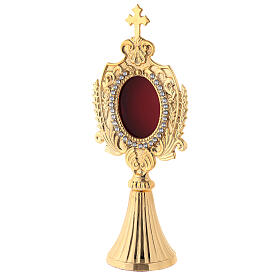 Reliquary with channelled bas and stones, gold plated brass, h 22 cm