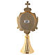 Reliquary with channelled bas and stones, gold plated brass, h 22 cm s5