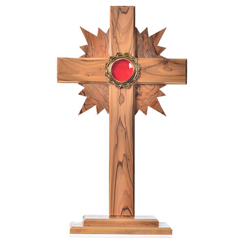 Reliquary in olive wood with rays H29cm, display in golden meta 1