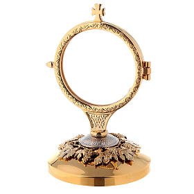 Golden monstrance with grapes and leaves decoration on the base, h. 15 cm