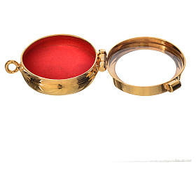 Reliquary in gold-plated brass diam. 3,5cm