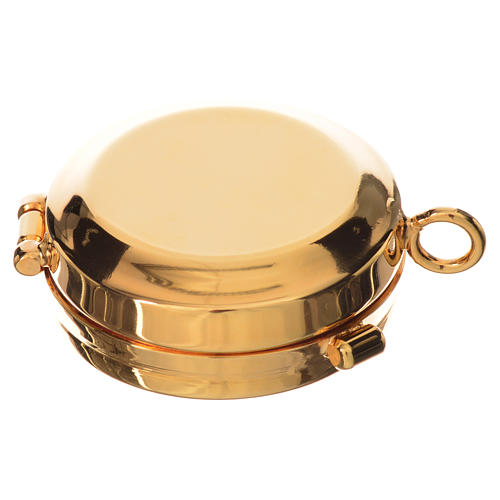 Reliquary in gold-plated brass diam. 4cm 8