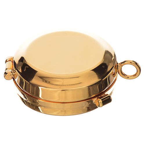 Reliquary in gold-plated brass diam. 4cm 3