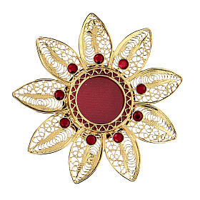 Reliquaire 5 cm forme de fleur argent doré pierres rouges