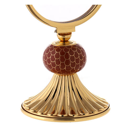 Brass monstrance with red enamelled node, 6 in 3