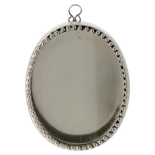 Oval wall reliquary of silver-plated brass, h 4 in 1