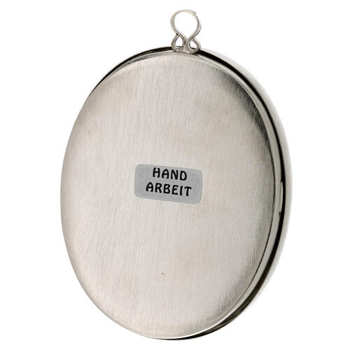 Oval wall reliquary of silver-plated brass, h 4 in 3