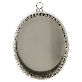 Oval wall reliquary in silvered brass, 6 cm high