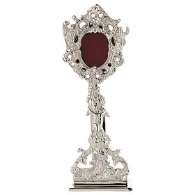 Silver-plated brass reliquary with floral pattern and silhouettes, h 9 in