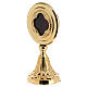 Modern round reliquary of gold plated brass, h 6 s2