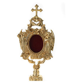 Baroque reliquary of gold plated brass, h 12 in, angels