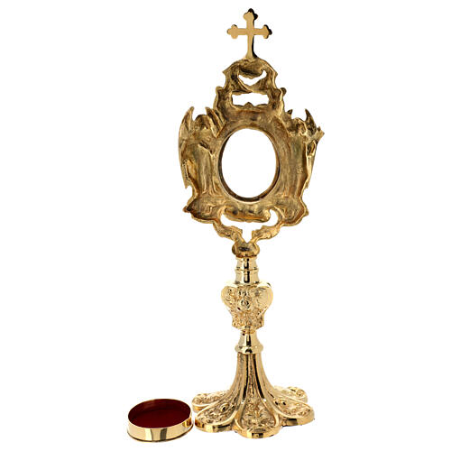 Baroque reliquary of gold plated brass, h 12 in, angels 6