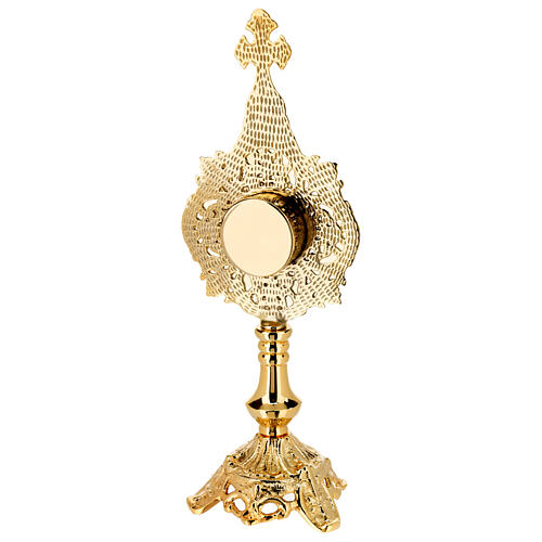 Baroque four-leaf clover reliquary, gold plated brass, h 13 in 7