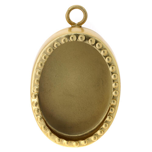 Wall reliquary of gold plated brass, oval with beads, h 2.5 in 1