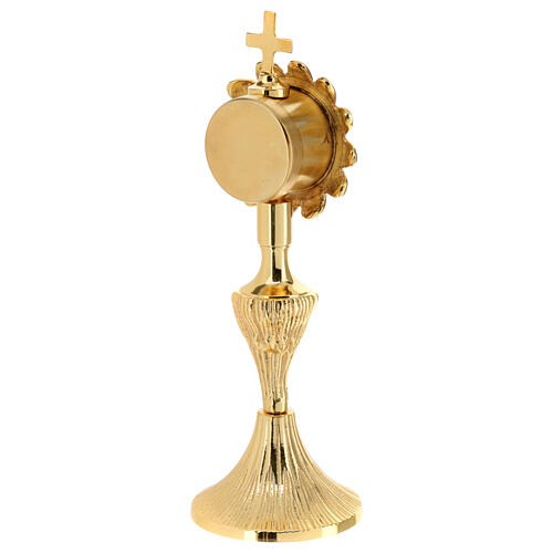 Flower-shaped reliquary, gold plated brass, h 7 in 4