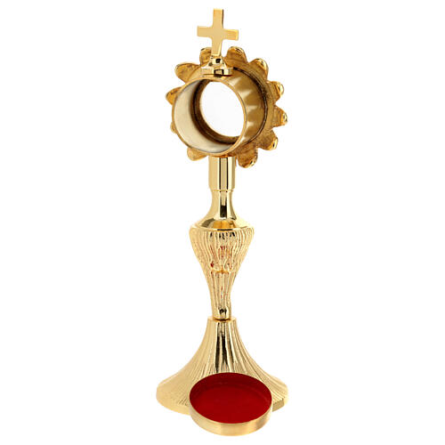 Flower-shaped reliquary, gold plated brass, h 7 in 5