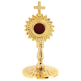 Gold plated brass reliquary of h 5 in, inner diameter of 1.2 in